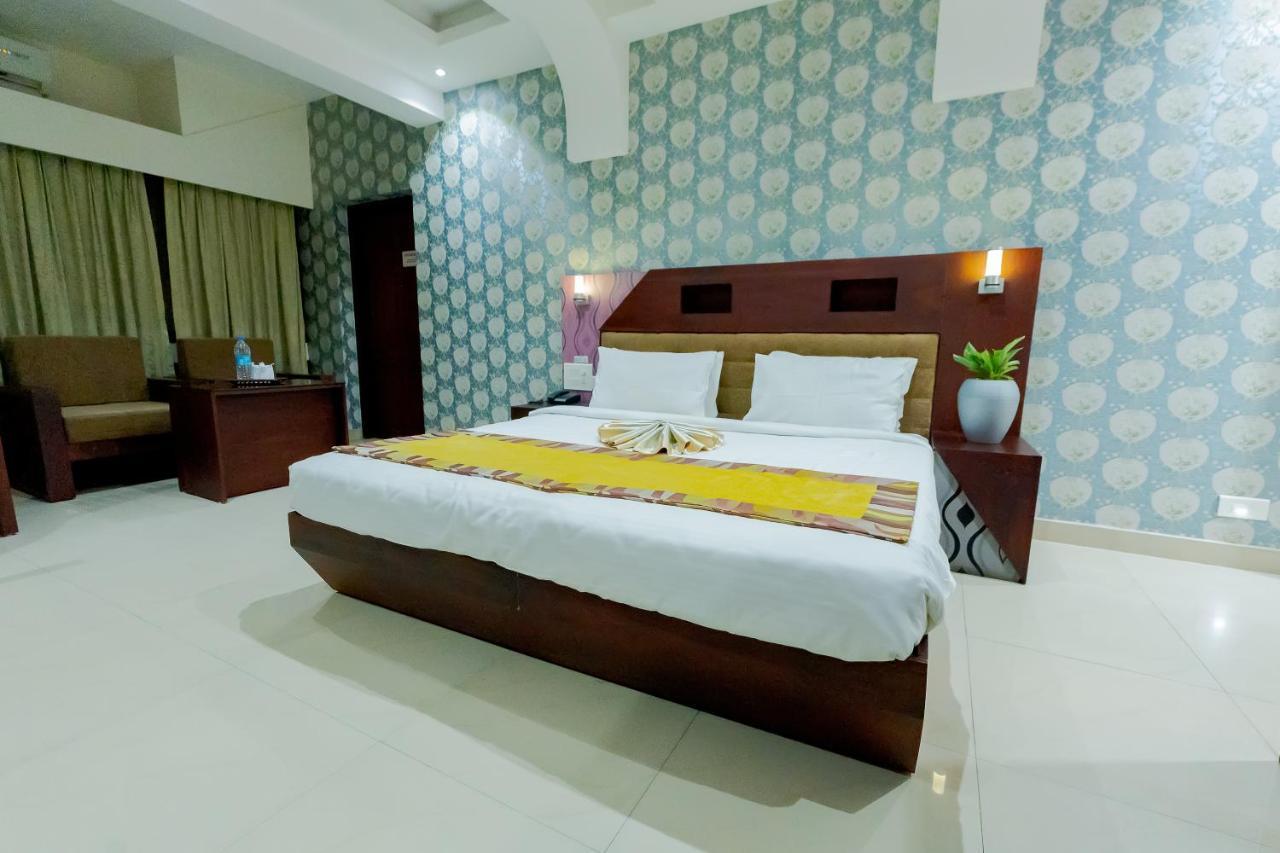ออร์คิด เรซิเดนซี Hotel กัตตะยัม ภายนอก รูปภาพ