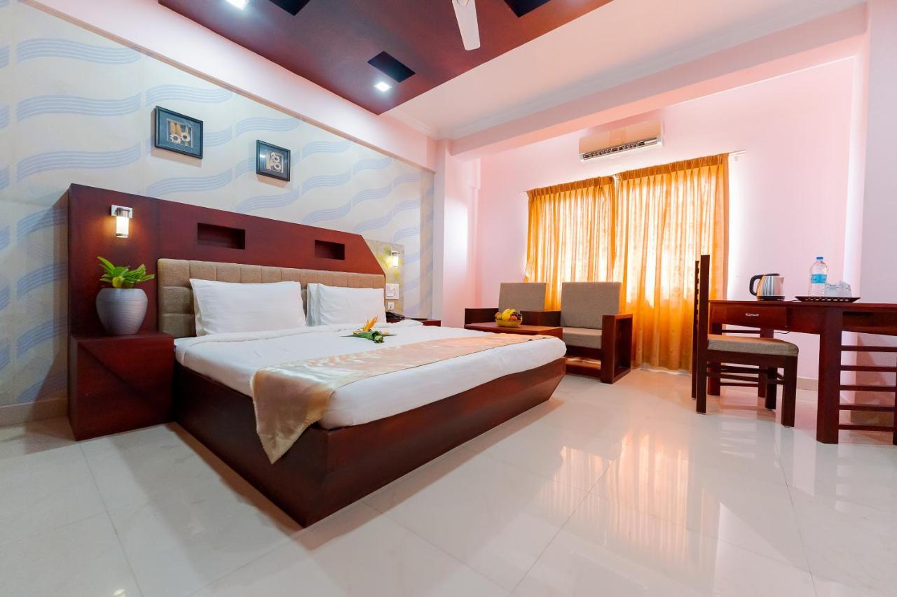 ออร์คิด เรซิเดนซี Hotel กัตตะยัม ภายนอก รูปภาพ