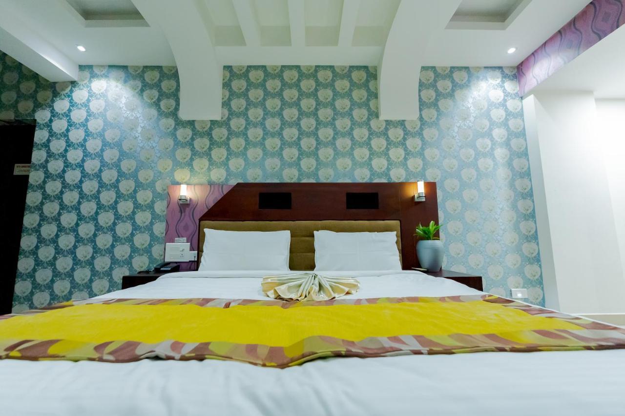ออร์คิด เรซิเดนซี Hotel กัตตะยัม ภายนอก รูปภาพ