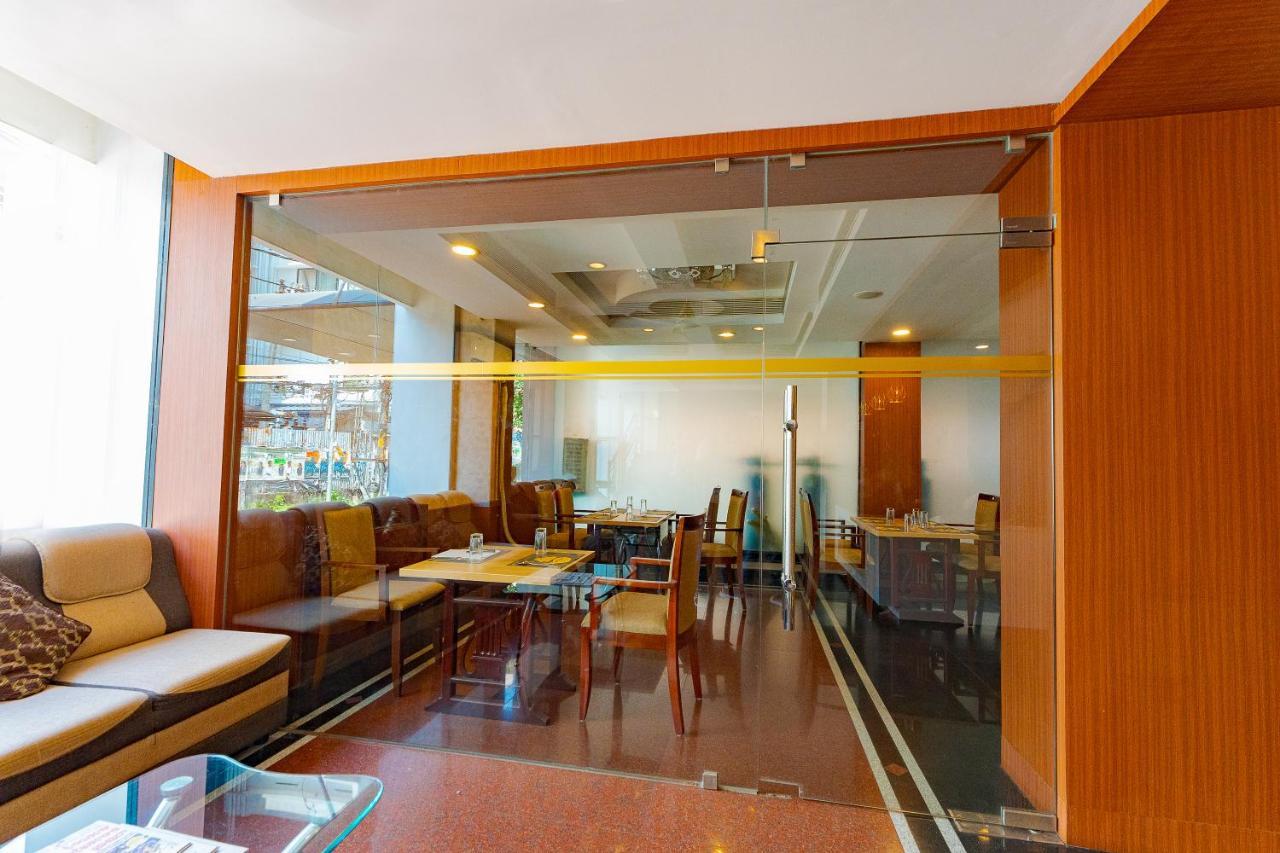 ออร์คิด เรซิเดนซี Hotel กัตตะยัม ภายนอก รูปภาพ