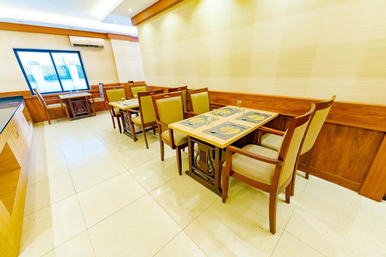 ออร์คิด เรซิเดนซี Hotel กัตตะยัม ภายนอก รูปภาพ