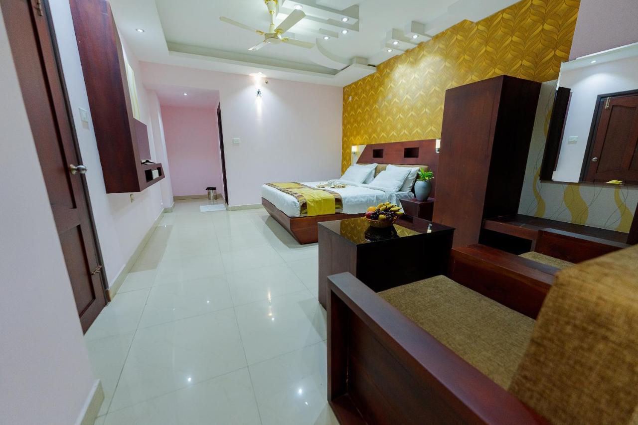 ออร์คิด เรซิเดนซี Hotel กัตตะยัม ภายนอก รูปภาพ