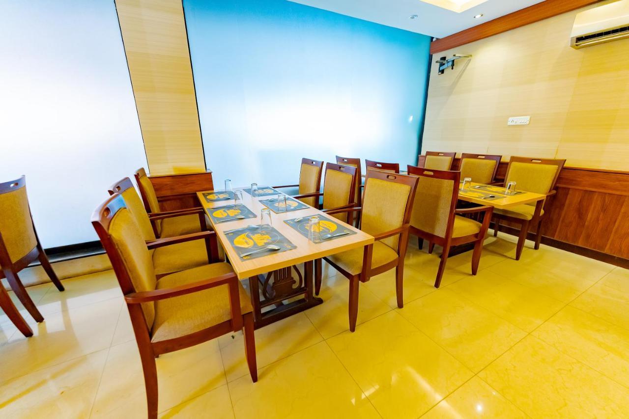 ออร์คิด เรซิเดนซี Hotel กัตตะยัม ภายนอก รูปภาพ