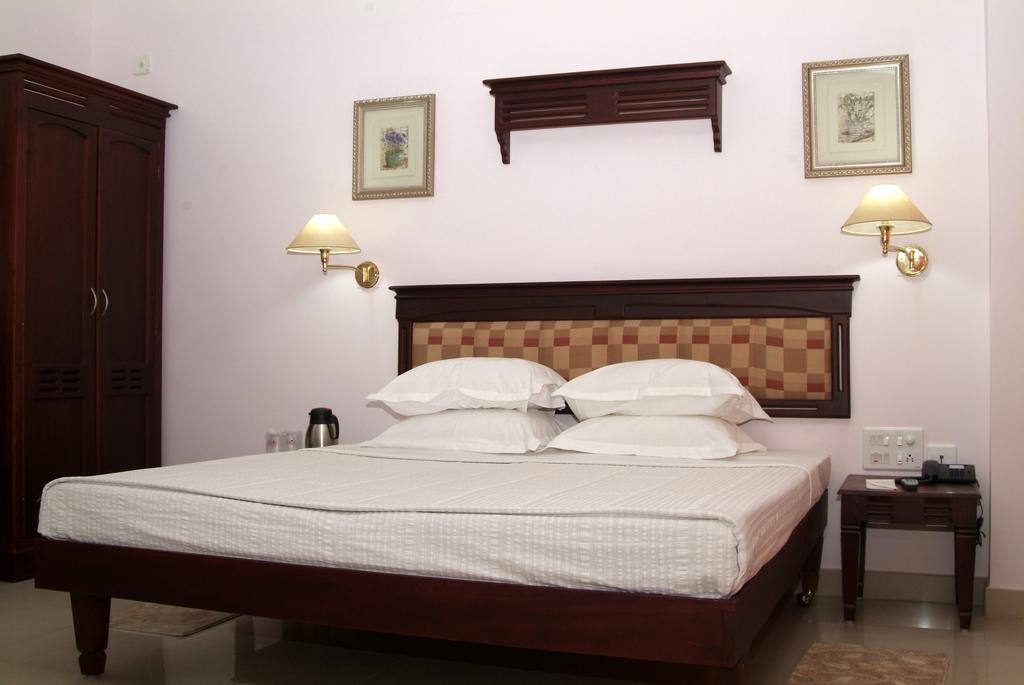 ออร์คิด เรซิเดนซี Hotel กัตตะยัม ภายนอก รูปภาพ