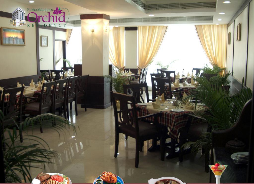 ออร์คิด เรซิเดนซี Hotel กัตตะยัม ภายนอก รูปภาพ