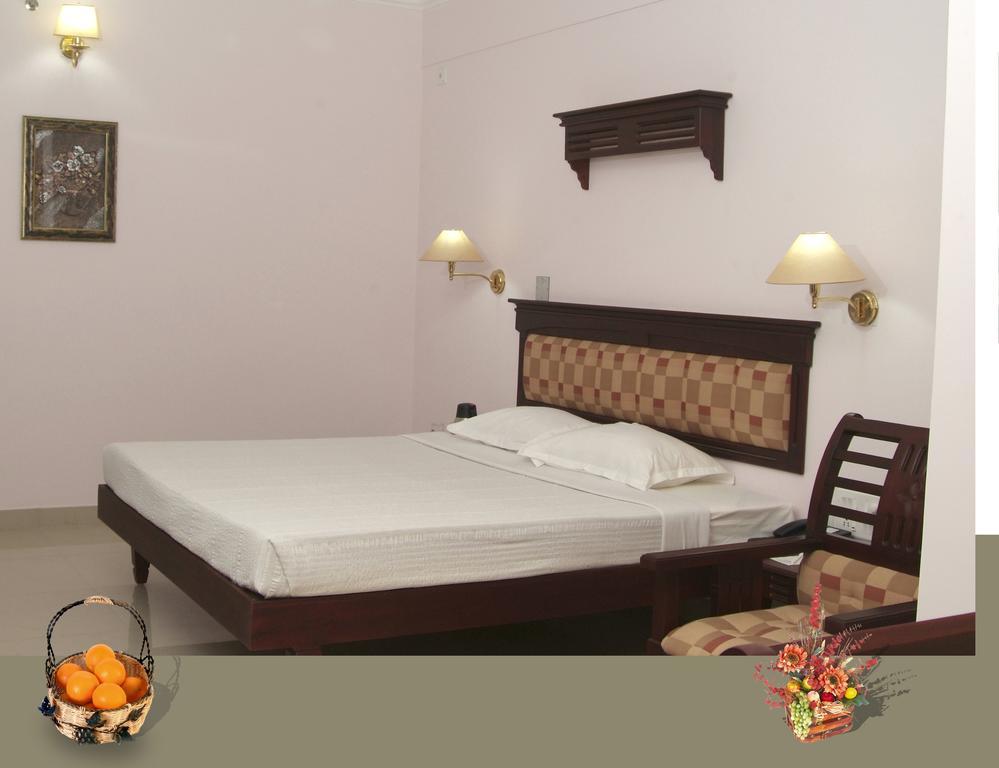ออร์คิด เรซิเดนซี Hotel กัตตะยัม ภายนอก รูปภาพ