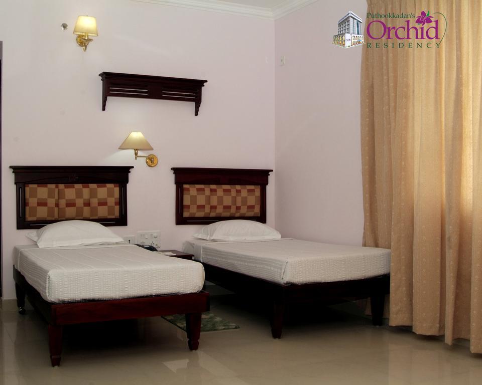 ออร์คิด เรซิเดนซี Hotel กัตตะยัม ภายนอก รูปภาพ