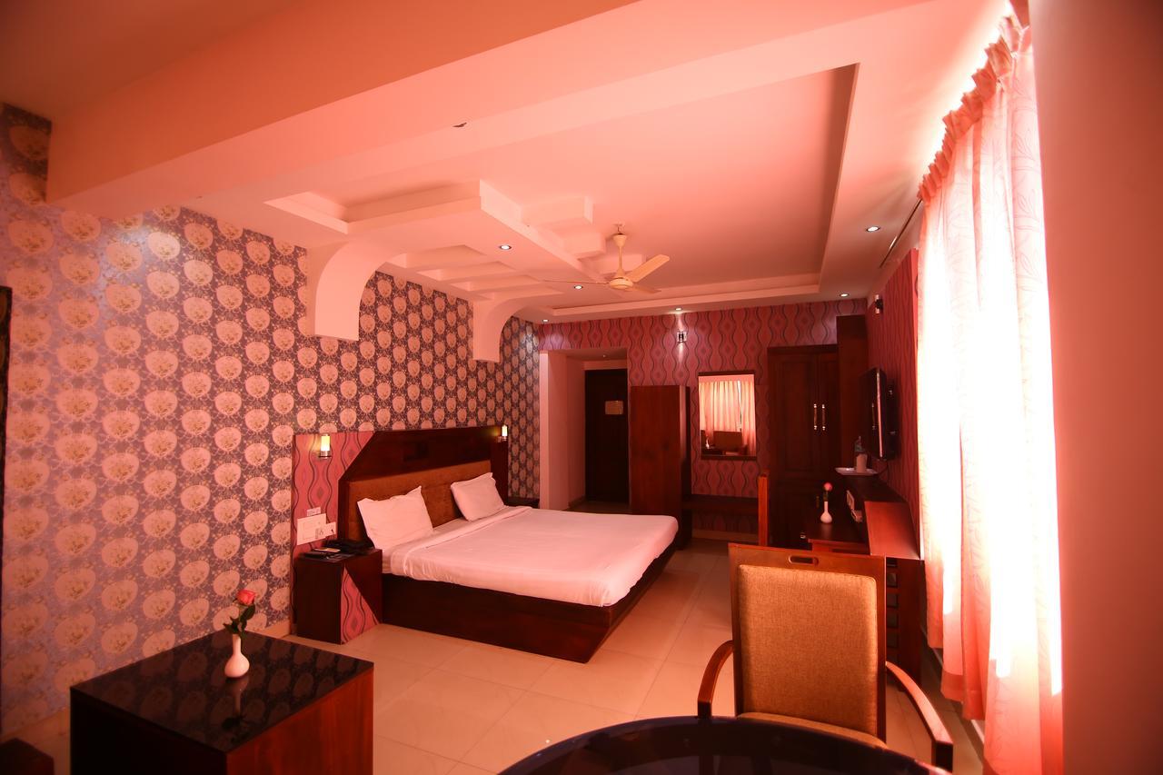 ออร์คิด เรซิเดนซี Hotel กัตตะยัม ภายนอก รูปภาพ