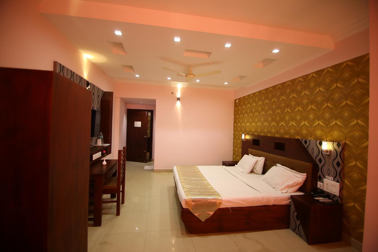 ออร์คิด เรซิเดนซี Hotel กัตตะยัม ภายนอก รูปภาพ
