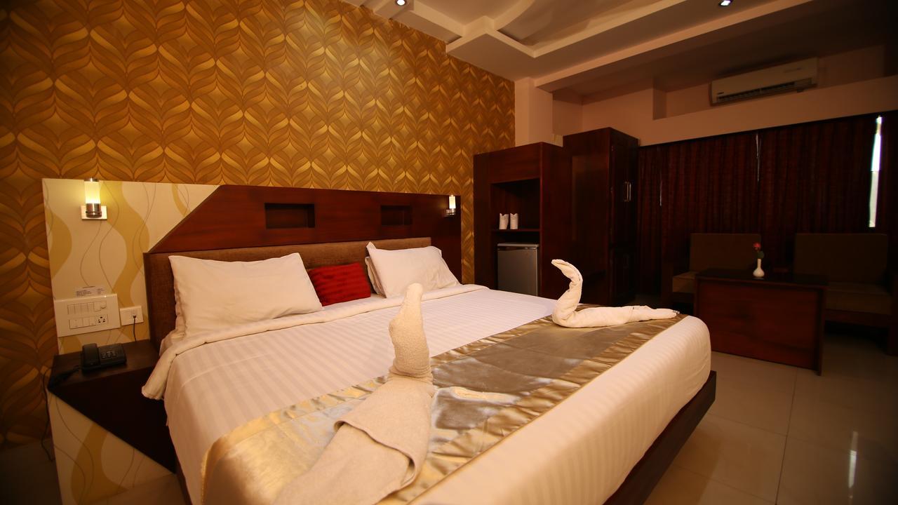 ออร์คิด เรซิเดนซี Hotel กัตตะยัม ภายนอก รูปภาพ