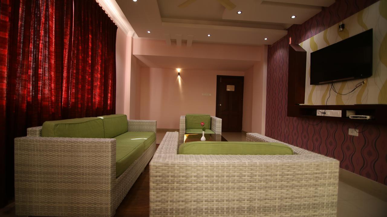 ออร์คิด เรซิเดนซี Hotel กัตตะยัม ภายนอก รูปภาพ